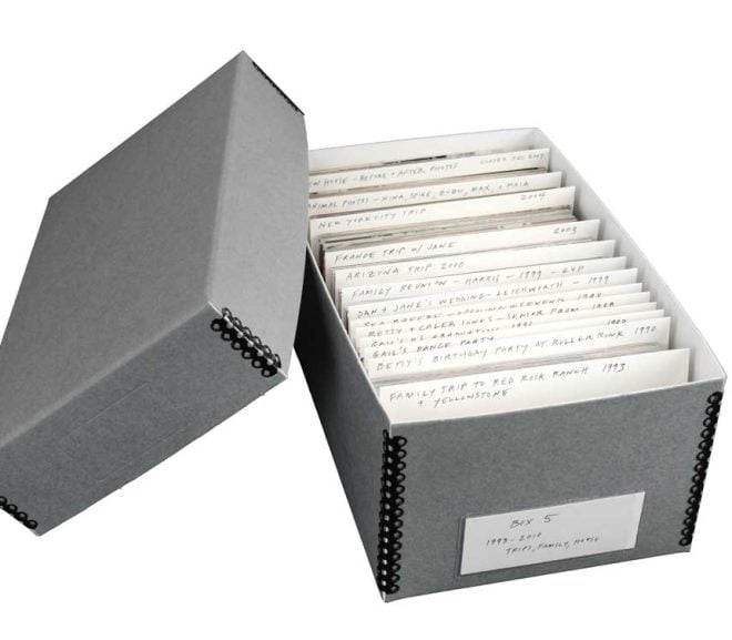 Gray acid-free metal edge box with card stock dividers storing and organizing 4 x 6 photographs