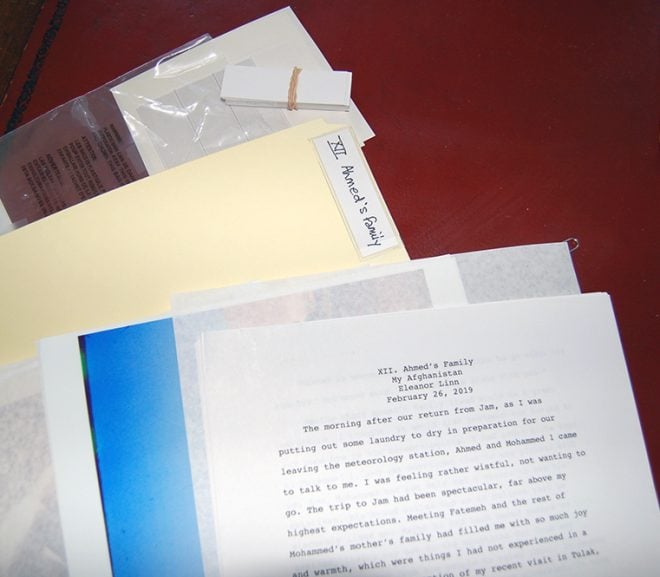 Manuscript, documents, and photos ready for archival storage