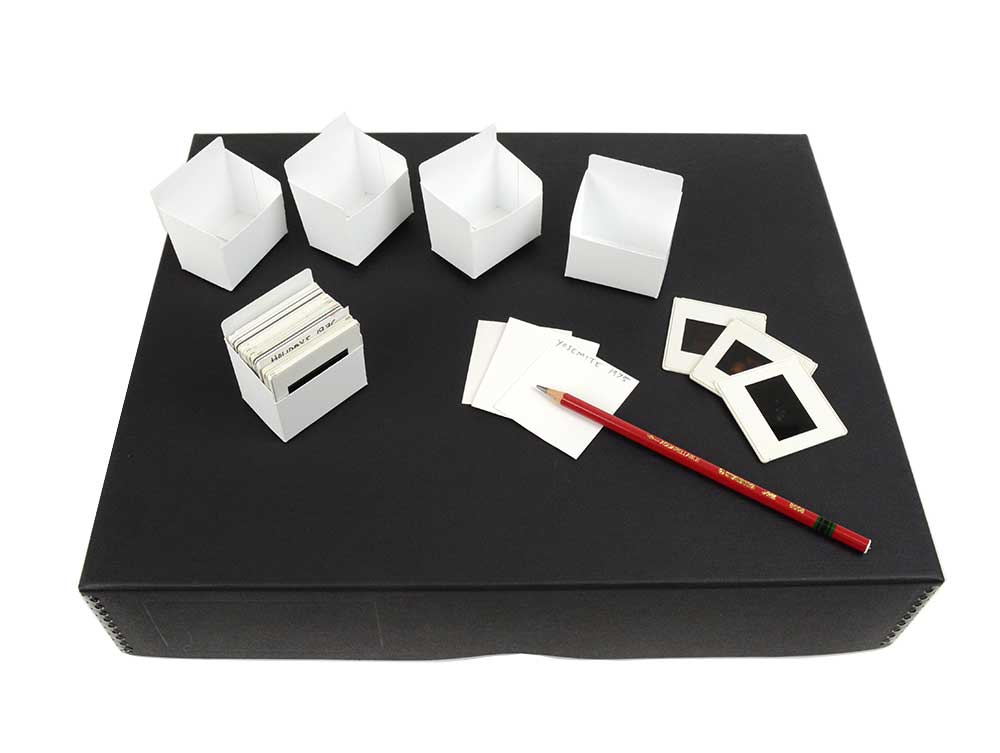 35mm Slide Storage Kit 1200 with acid-free boxes, slide trays, and dividers for safe organization and preservation of slides.