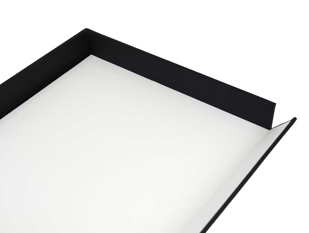 Museum Drop Front Box is an archival storage box made from acid-free materials with a drop-front design for preserving and accessing artwork. 
