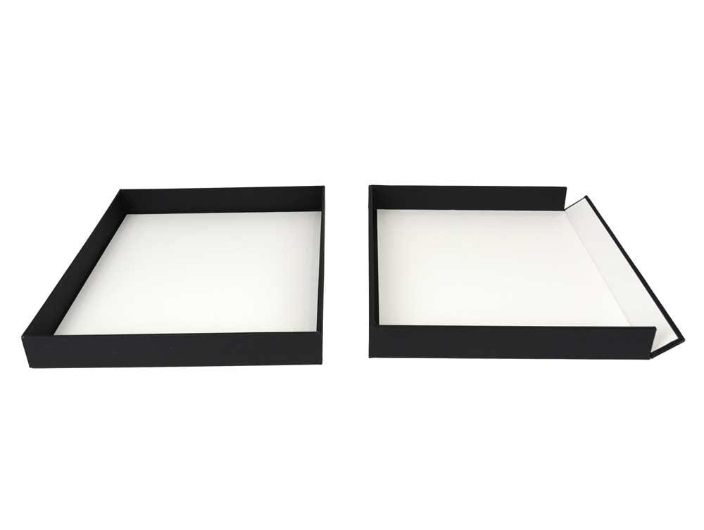 Museum Drop Front Box is an archival storage box made from acid-free materials with a drop-front design for preserving and accessing artwork. 