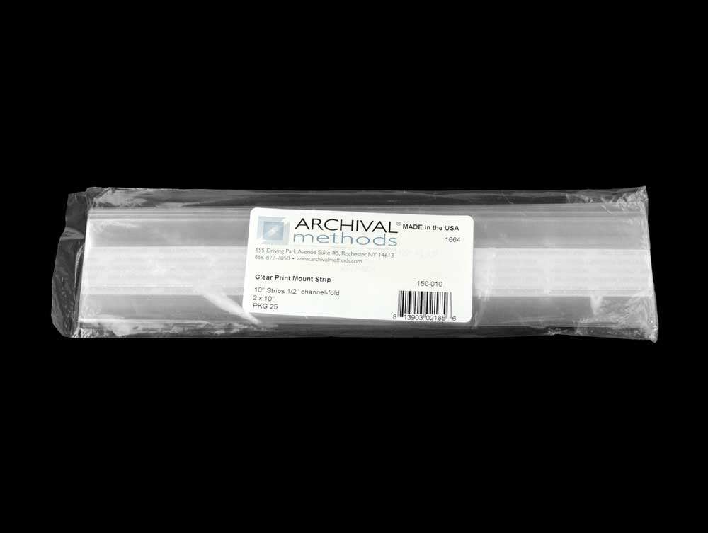 Archival-quality clear print mounting strips with self-adhesive backing, securely holding artwork in place without direct contact with adhesive.