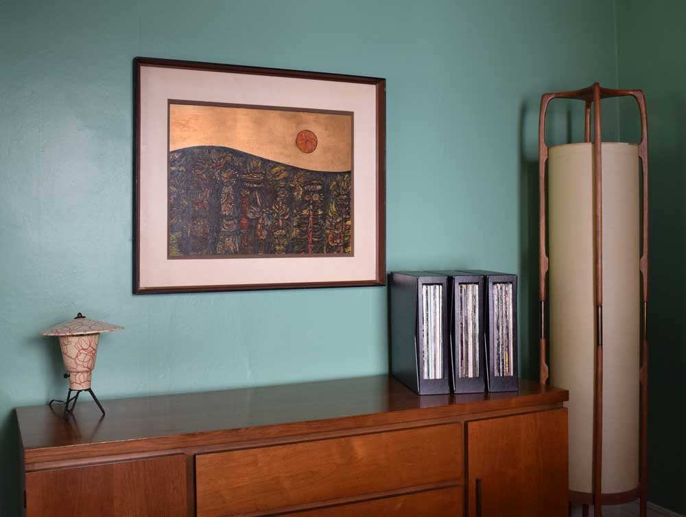 Showing three Vinyl Record Storage boxes on a table in a contemporary room. Box made of archival materials.