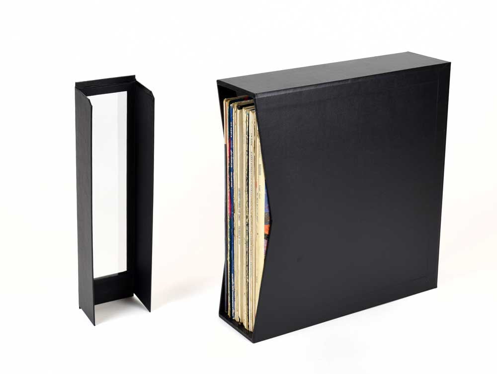 A Vinyl Record Storage box made of archival materials, with 12'' LP records in the box and the protective cover removed.