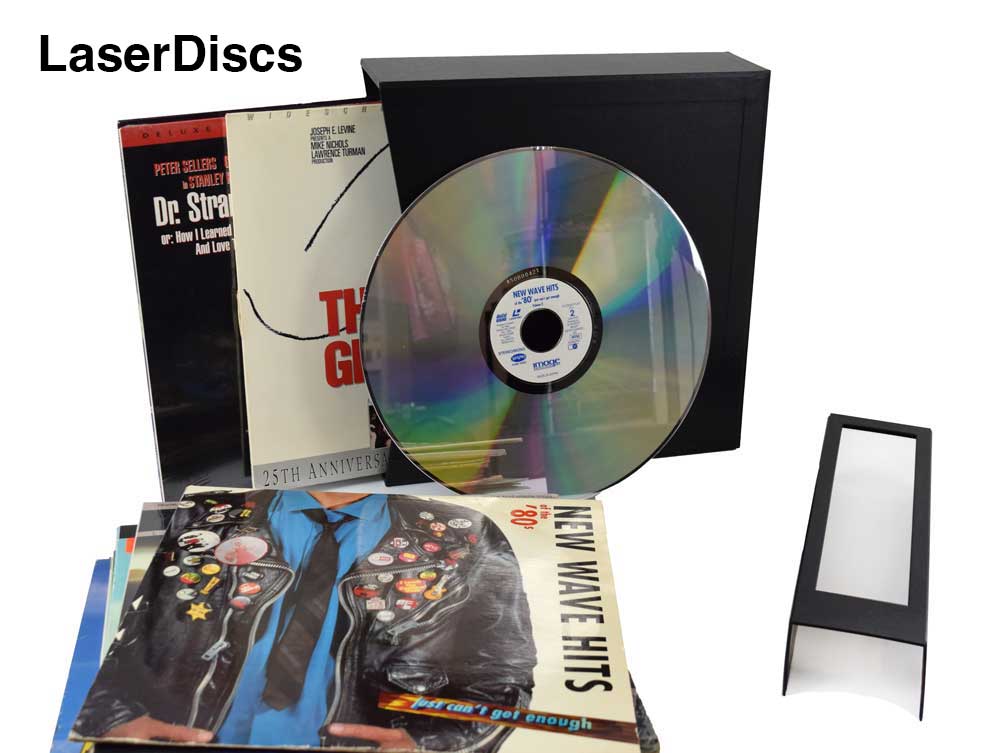 Vinyl Record Storage Box for 12” records with LP record covers displayed with see-through protective covers. Box made of archival materials.