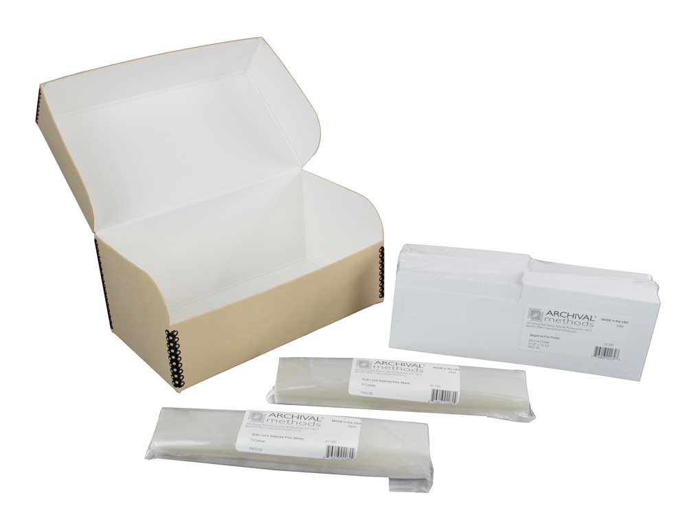 Archival Film Storage Kits featuring acid-free sleeves, sorting folders, and durable archival boxes for preserving 35mm negatives, 120 film, and 4x5 film.
