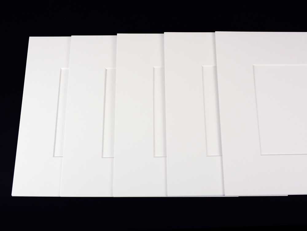 Enhance artwork with pre-cut exhibition mats, 4-ply, acid-free board, offering archival protection with beveled windows and 2-ply backing.