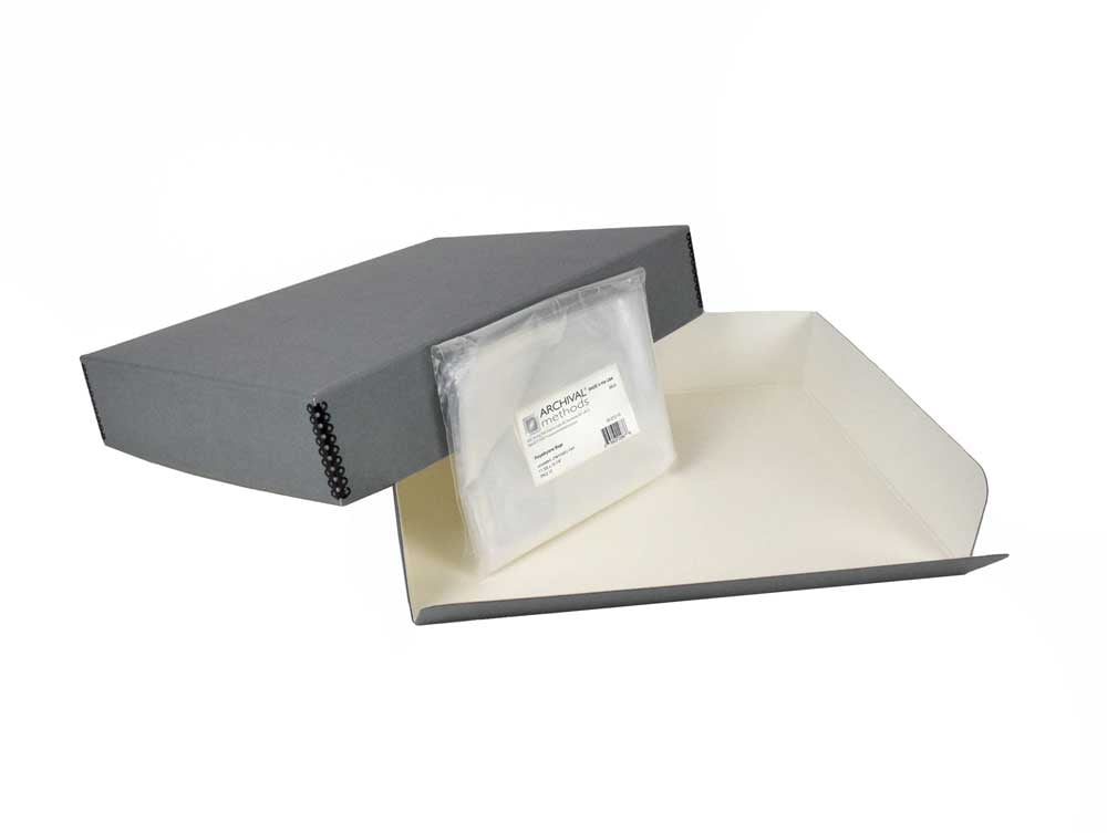 Gray Archival Newspaper & Magazine Storage Kit with acid-free storage box, polyethylene bags, and for long-term preservation.