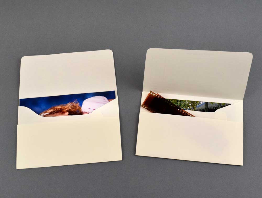 Acid-free Archival Photo Envelopes ensure safe photo storage, allowing notes on image details while holding up to 36 prints or 35mm negatives.