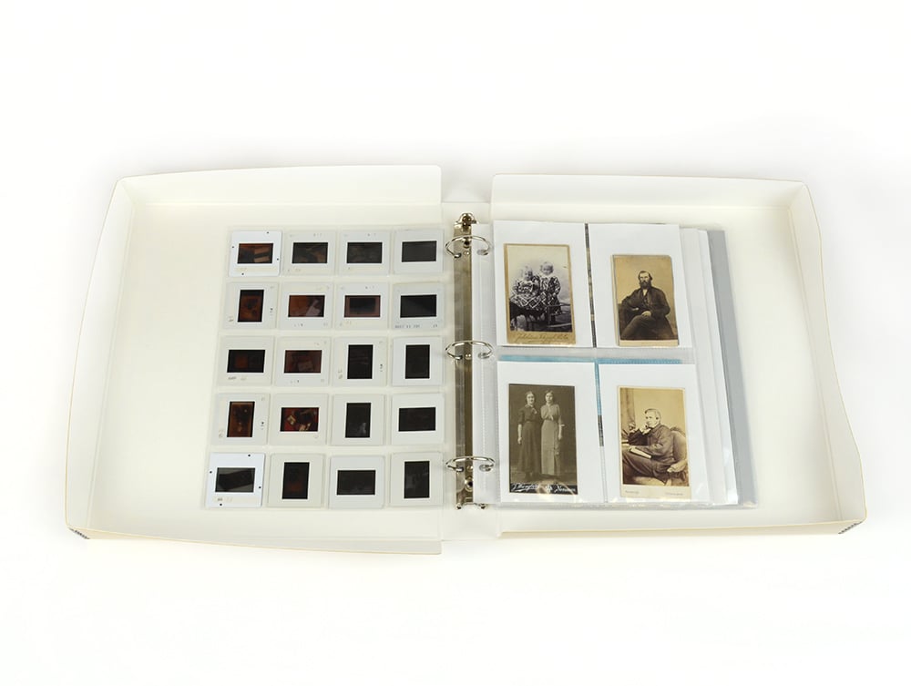 Open tan Binder-In-A-Box combines a 3-ring binder & box made from acid-free materials for preserving photos and documents.