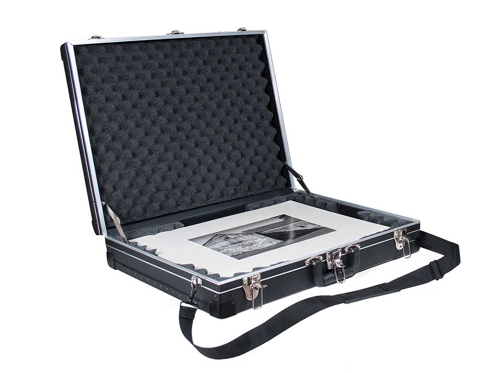 Art Carry Case with durable construction, handle, and removable shoulder strap for safely transporting and protecting valuable artwork 