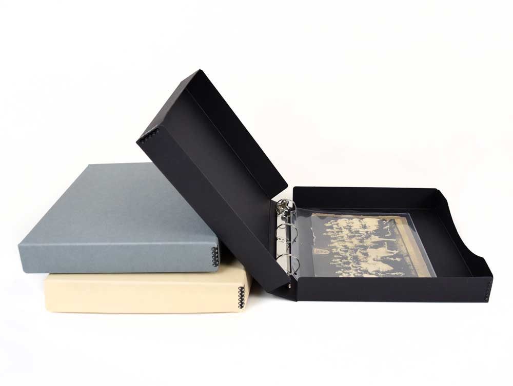 Binder-In-A-Box combines a 3-ring binder & box made from acid-free materials for preserving photos and documents. Showing: tan, black, gray. 
