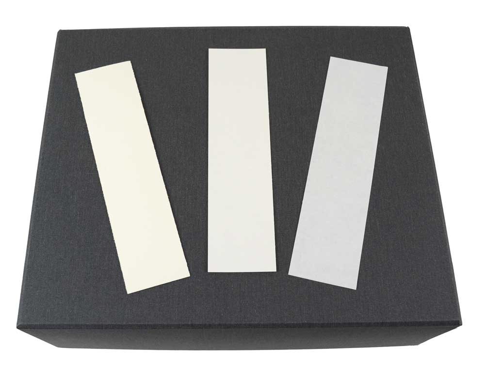 Archival Bookmarks made from acid-free paper in three thicknesses—Thin Paper, Archival Paper, and White Card Stock—protect books without damage.