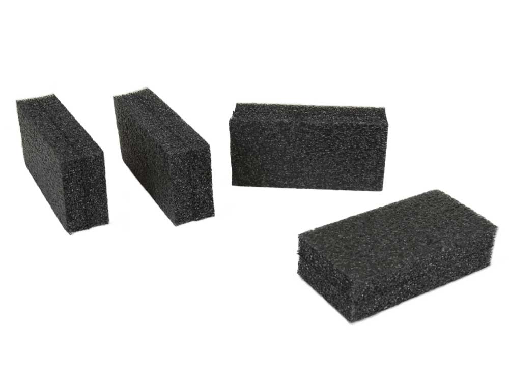Four foam blocks cut down to use with the Art Carry Case to adjust interior size
