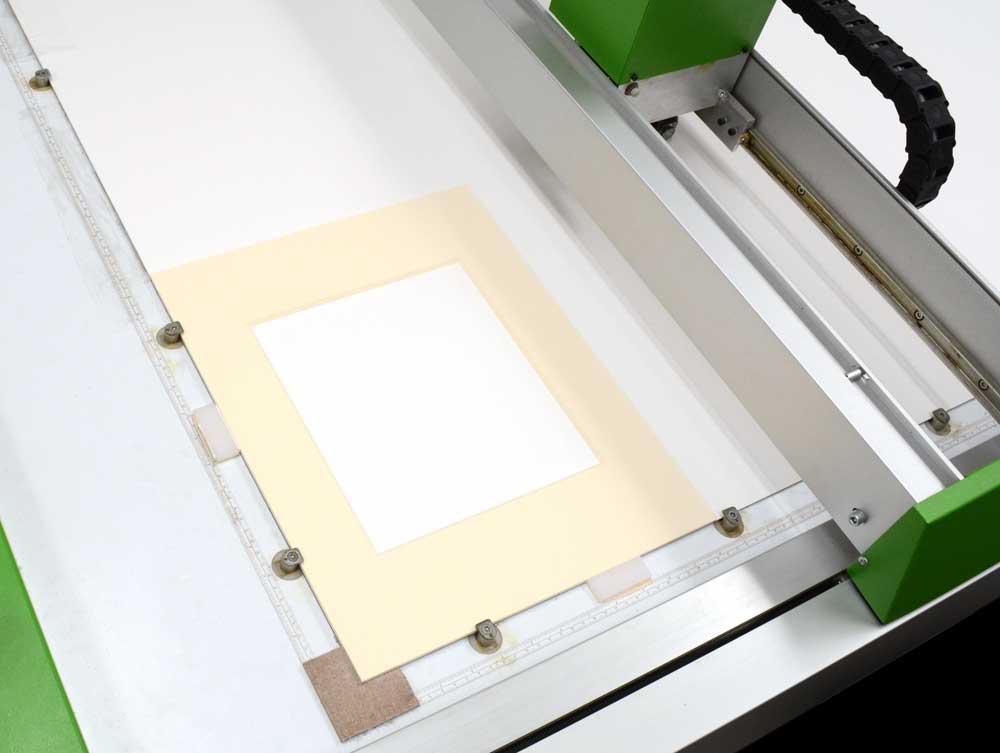 Custom mat cutting for museum-quality window mats, providing archival protection for artwork, photos, and prints with acid free mat boards.