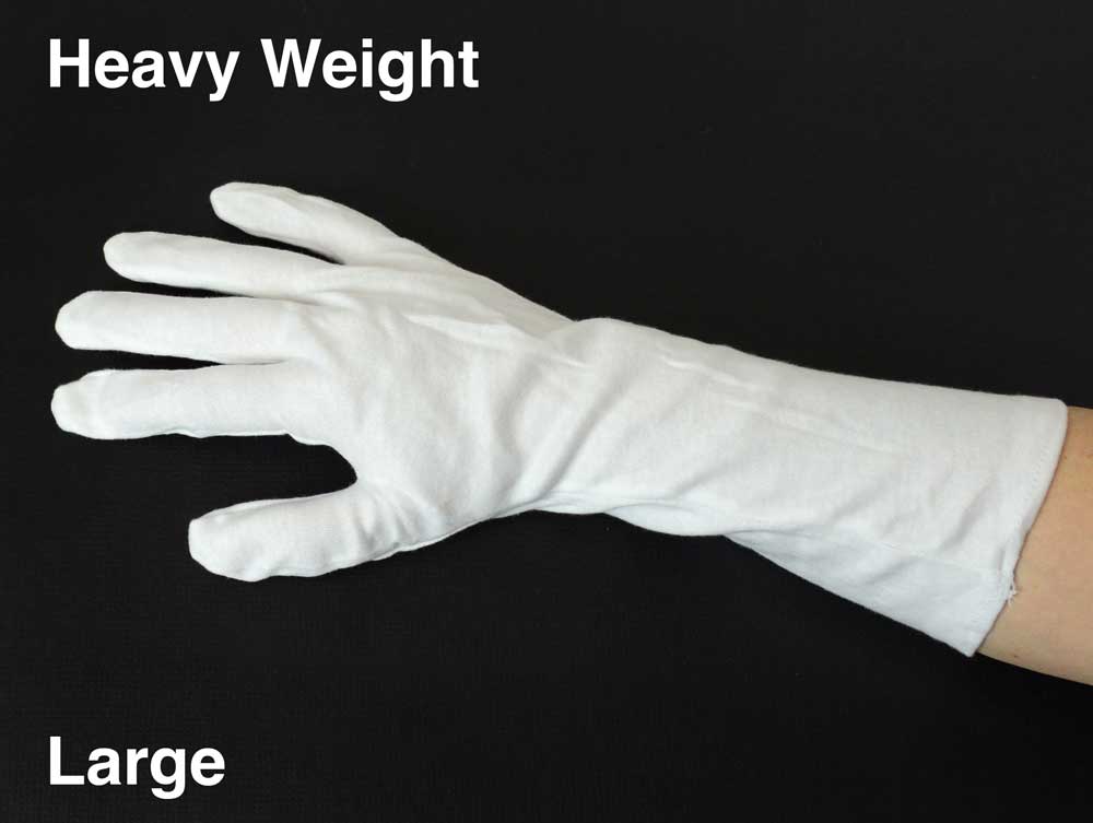 White cotton inspection gloves protect photographs and artifacts from oils and fingerprints during handling and archival care. 