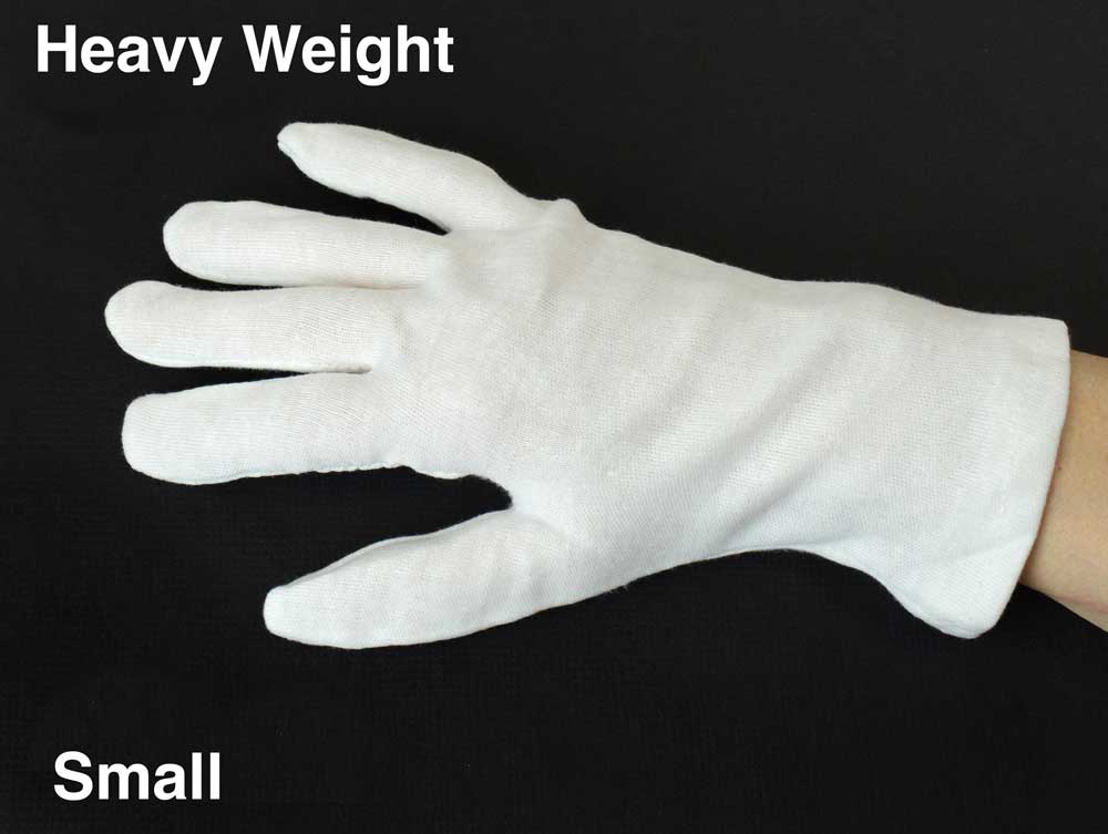 White cotton inspection gloves protect photographs and artifacts from oils and fingerprints during handling and archival care. 