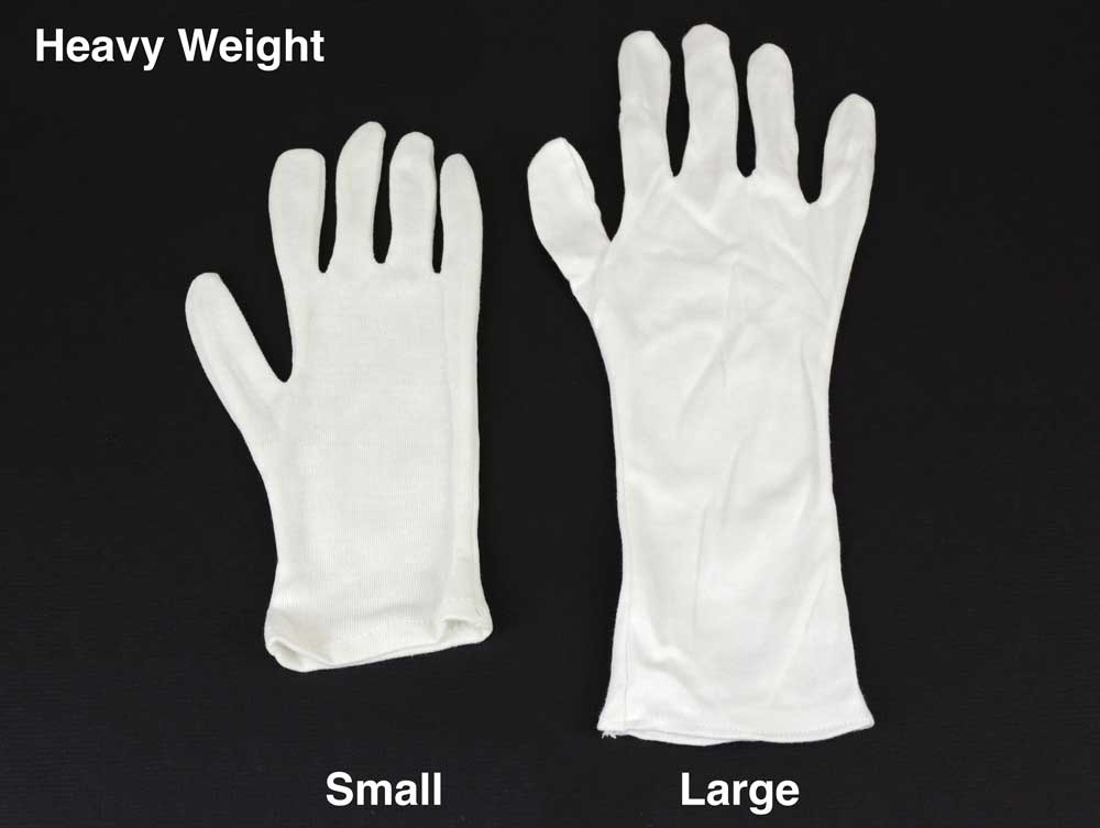 White cotton inspection gloves protect photographs and artifacts from oils and fingerprints during handling and archival care. 