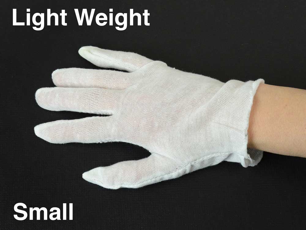 White cotton inspection gloves protect photographs and artifacts from oils and fingerprints during handling and archival care. 