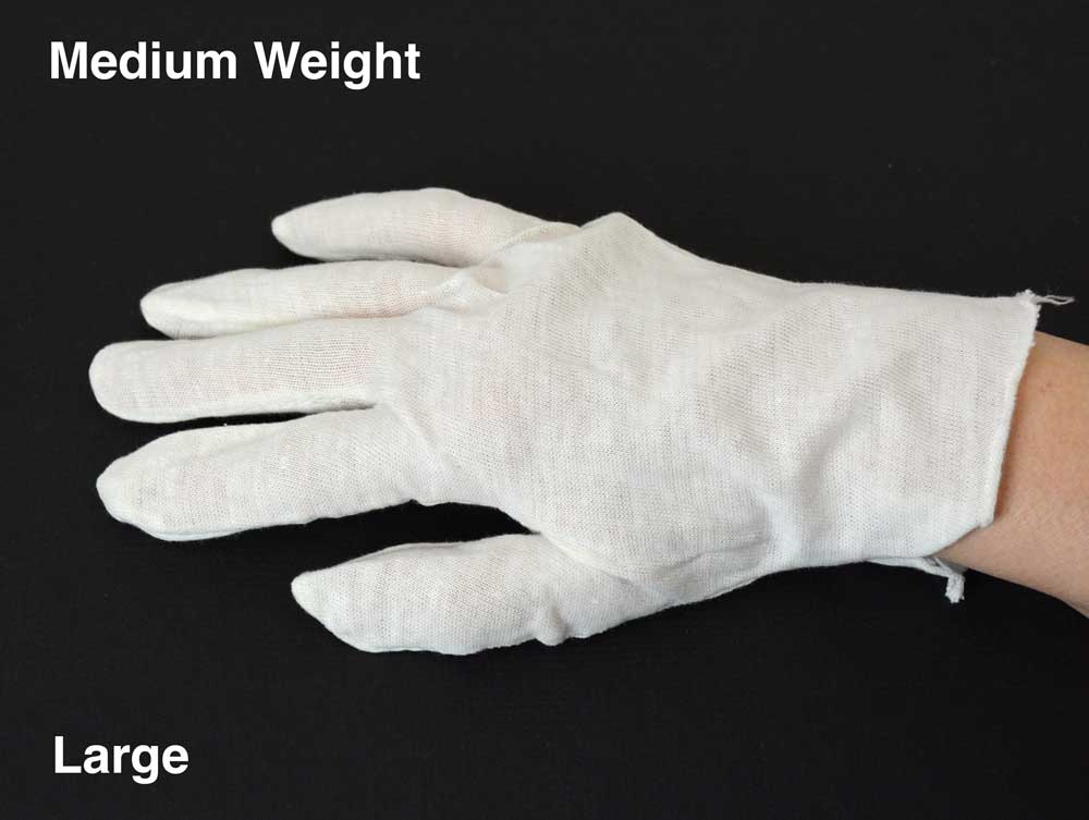 White cotton inspection gloves protect photographs and artifacts from oils and fingerprints during handling and archival care. 