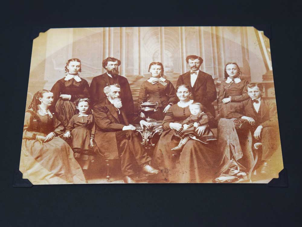 Black Acid-Free 3-hole Mounting Pages with 1 photos in the archival-quality album