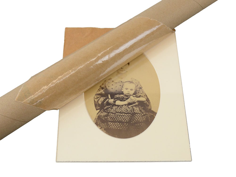Removing paper from UV-Filtering Acrylic using a tube makes it quick and easy This acrylic blocks 98% of UV rays to prevent fading. 