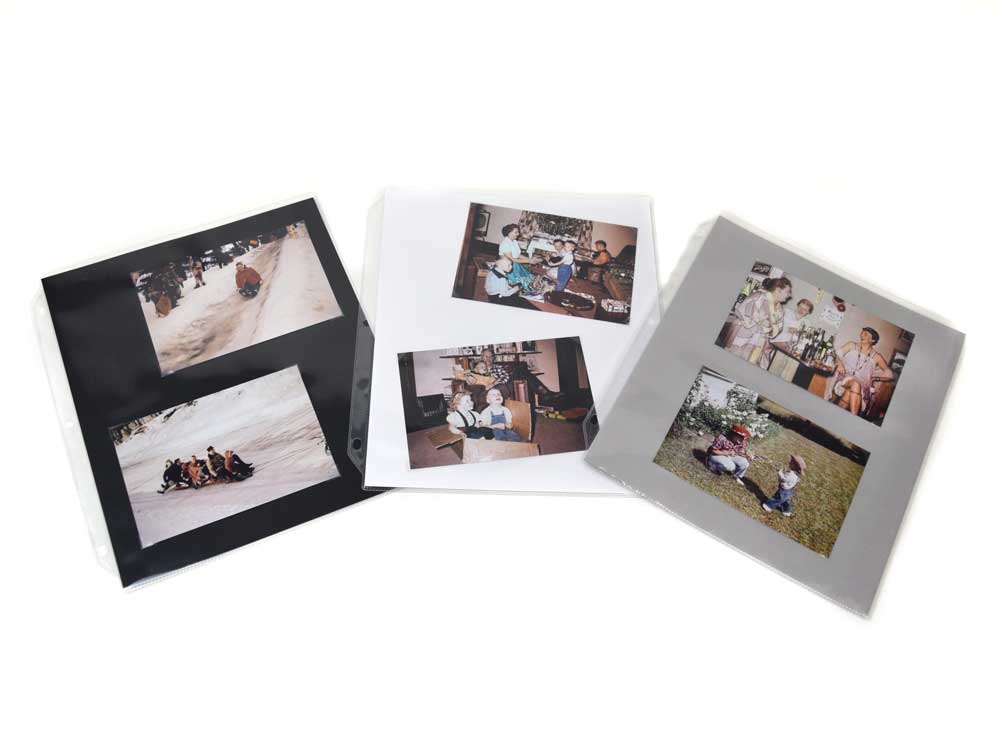 Acid-free card stock inserts in black, white, and gray with photos mounted ready 
for Print Pages, providing support & protection.
