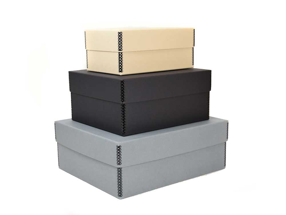 Three archival Short Top Boxes made from acid-free materials, stacked with closed tops, showing tan, gray, and black options.