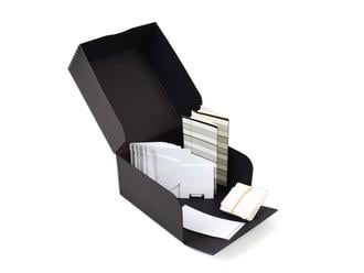 USB/Memory Card Storage Kit with acid-free archival box, indexing card, and labels, designed to organize and protect digital storage devices.