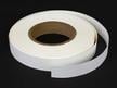 Roll of one inch acid-free Tyvek tape showcasing its use for hinging window mats and bookbinding.  thumbnail
