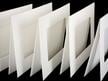Enhance artwork with pre-cut exhibition mats, 4-ply, acid-free board, offering archival protection with beveled windows and 2-ply backing. thumbnail