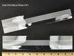 Archival-quality clear print mounting strips with self-adhesive backing, securely holding artwork in place without direct contact with adhesive. thumbnail