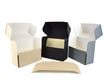 Acid-free document storage boxes, tan, black, and gray, to preserve photos, records, and documents against deterioration. thumbnail