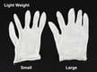 White cotton inspection gloves protect photographs and artifacts from oils and fingerprints during handling and archival care.  thumbnail