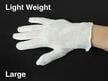 White cotton inspection gloves protect photographs and artifacts from oils and fingerprints during handling and archival care.  thumbnail