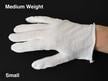 White cotton inspection gloves protect photographs and artifacts from oils and fingerprints during handling and archival care.  thumbnail