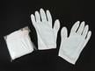 Nylon Lintless inspection gloves protecting documents and artifacts from fingerprints, ideal for delicate handling and archival care.  thumbnail
