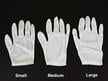 Nylon Lintless inspection gloves protecting documents and artifacts from fingerprints, ideal for delicate handling and archival care.  thumbnail