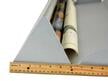Close-up of a 6-inch side assembled Triangular Roll Storage box made of acid-free corrugated material. thumbnail